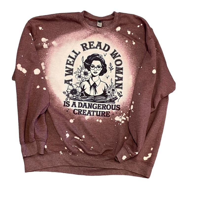 A well read woman is a dangerous creature sweatshirt - Bleached unisex fit crewneck sweatshirt