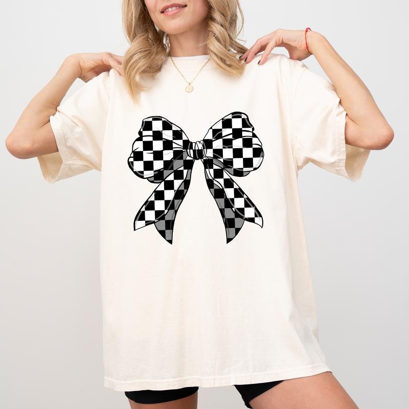 Checkered Retro Bow Halloween Shirt, Black Ribbon Tee, Checkered Bow Tee For Women, Coquette Black Bows Graphic Printed Tee, Funny Halloween Bow Gift, Short Sleeve Shirt For Women, Daily Womenswear, Cotton Fabric Unisex Tee, Casual Streetwear