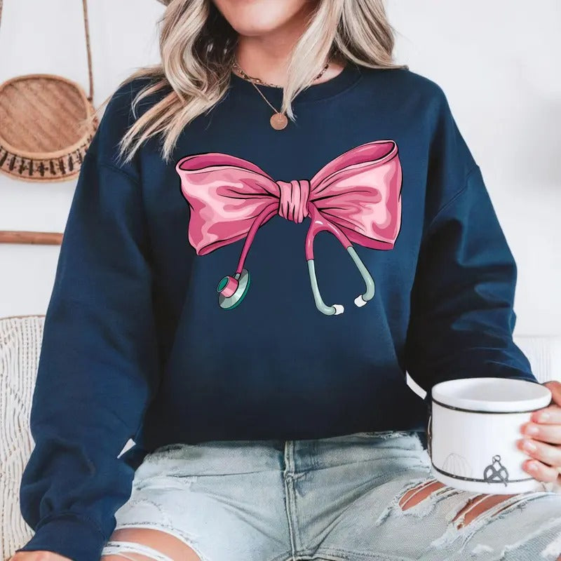 Coquette Nurse Stethoscope Bow Sweatshirt, Gift For Nurse, Bow Oversized Crewneck, Nurse Appreciation Shirt, Nurse Shirt, Pink Bow Nurse Shirt, ER RN Nursing Shirt