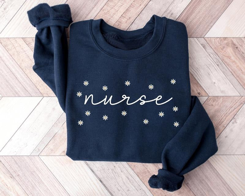 Daisy Nurse RN ER Sweatshirt, Floral Nurse Shirt, Nurse Sweater, Nursing Crewneck, BSN RN ER Graduation Gift For New Nurse, Nurse Shirt, Nurse Gift