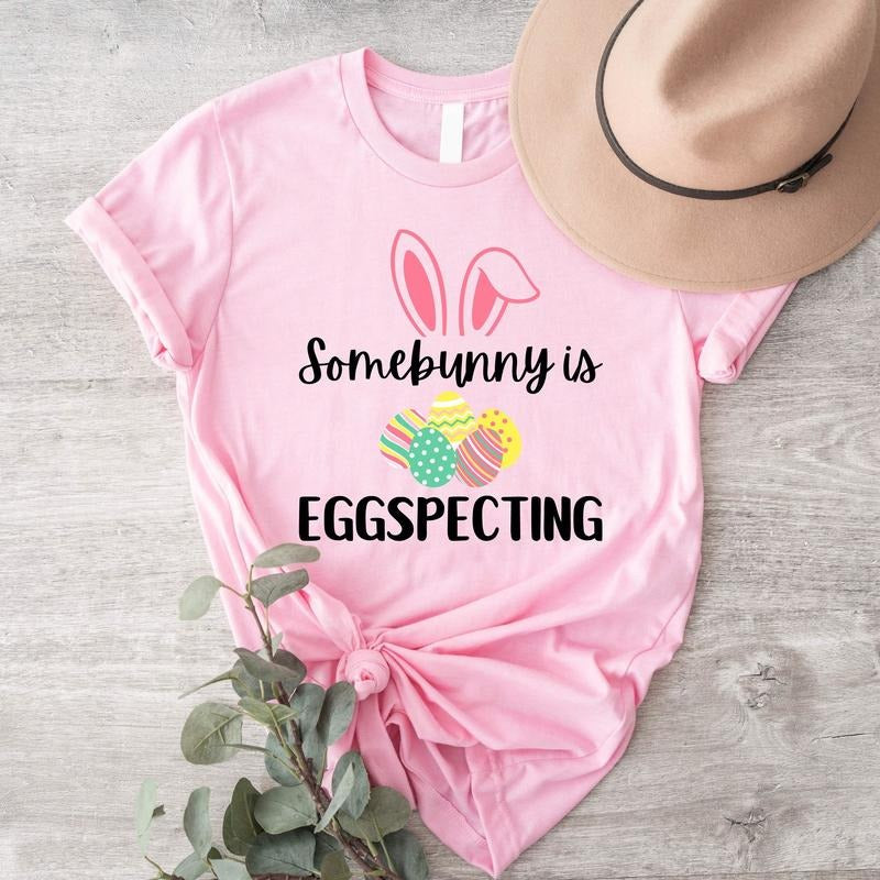Easter Pregnancy Announcement Shirt, Spring Baby Reveal T-Shirt, Maternity Tee, Pregnant Wife Gift Shirt For Easter, New Mom To Be Short Sleeve.