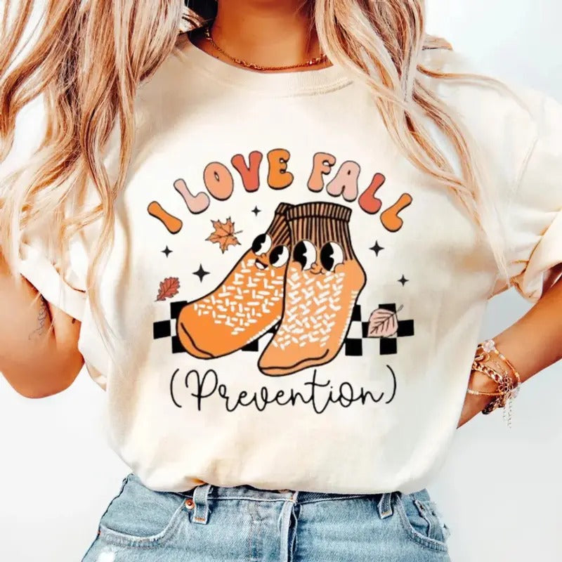 Fall Nurse Shirt, Thanksgiving Nurse Shirt, I Love Fall Prevention Shirt, Cute Stocking Fall Shirt , Unisex Short Sleeve Tee Shirt, Casual Clothing