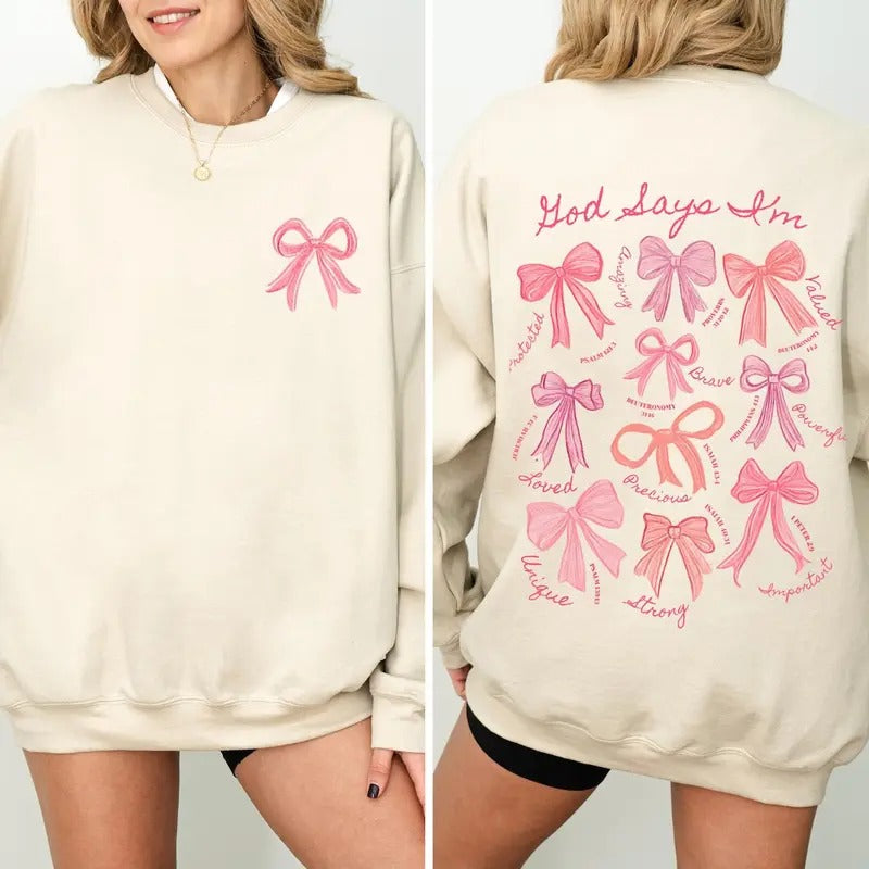 God Says I Am Coquette Bow Sweatshirt, Women's Christian Sweatshirt, Pink Christmas Jesus Faith Sweatshirt