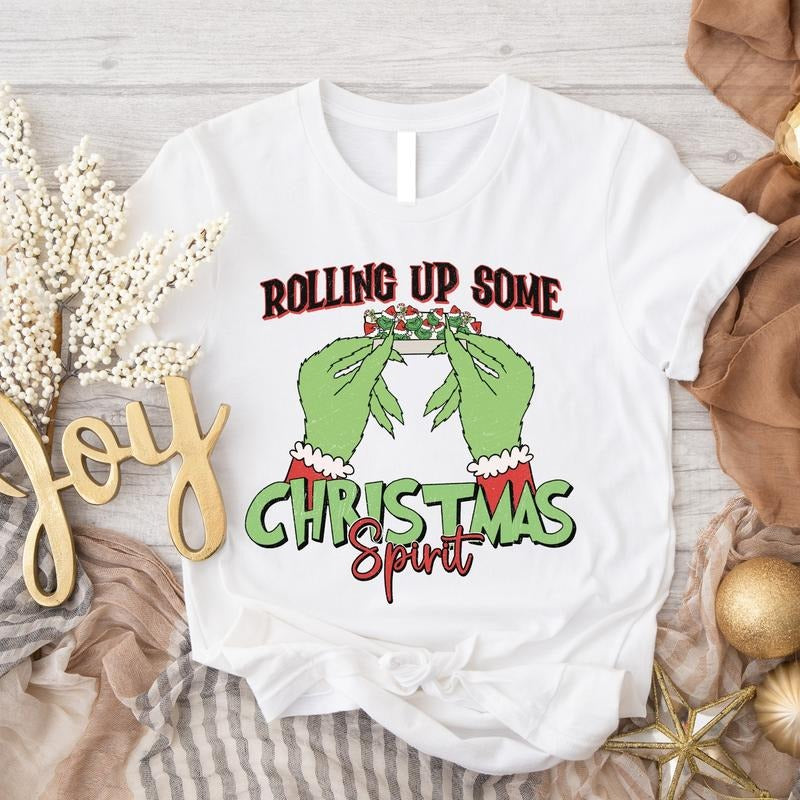 Rolling Up Some Christmas Spirit Shirt, Funny Christmas Gift T-Shirt, Trendy Shirt For Christmas, Retro Christmas Short Sleeve, Smoking Christmas Shirt.