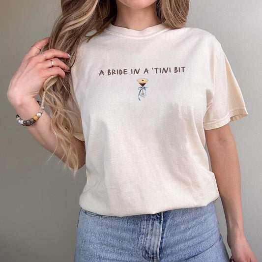 A Bride in a Tini Bit Bride T-shirt, Coquette Espresso Martini Themed Future Tshirt, Tini Bit Engaged, Bridal Shower Gift Idea for Fiance