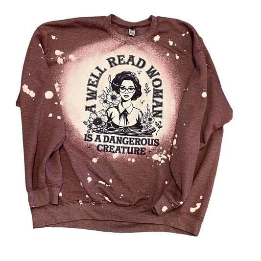 A well read woman is a dangerous creature sweatshirt - Bleached unisex fit crewneck sweatshirt