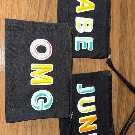 Adorable Black Wristlet Bag with bright patches