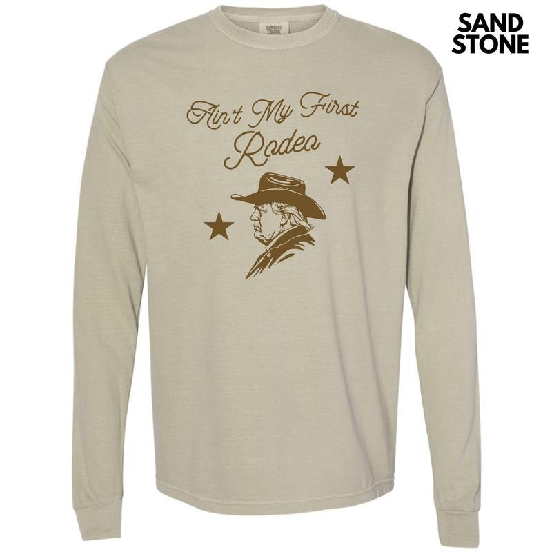 Ain't My First Rodeo Long Sleeve Comfort Colors T-Shirt 'NLB' Hoodie, Sweatshirt | DripVista.com