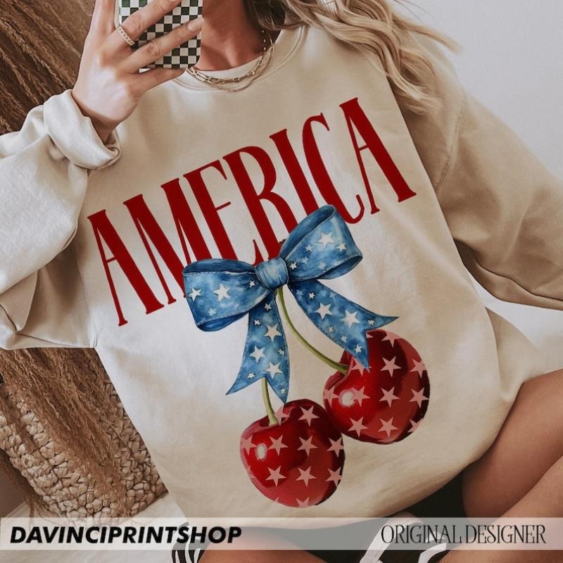 America Cherries Shirt, Cherry Bow Tee, Trendy July 4th , 4th of july Woman , Usa Flag Sweatshirt Hoodie | DripVista.com