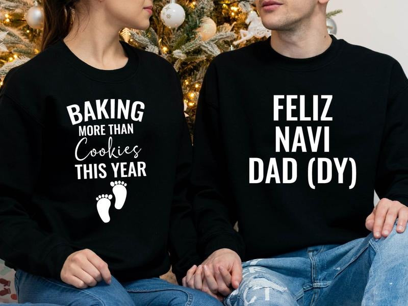 Baking More Than Cookies This Year Sweatshirt, Feliz Navi Dad (DY) Sweater, Matching Couples Baby Announcement Hoodie, Christmas Pregnancy Sweatshirt, Baby Reveal Sweater.