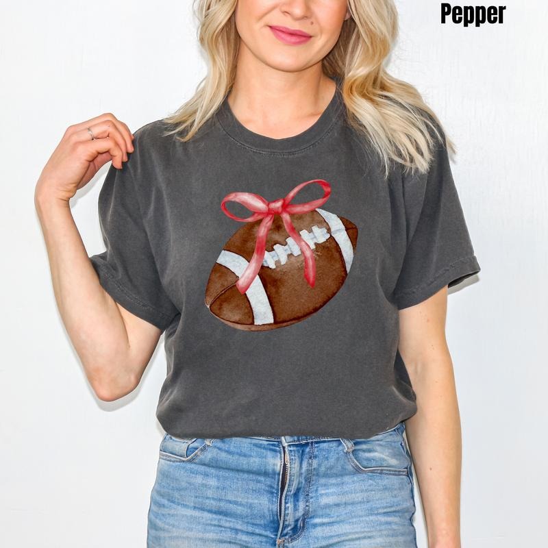 *CUSTOMIZABLE* Bow & Football Comfort Colors T-Shirt 'NLB' Hoodie, Sweatshirt | DripVista.com