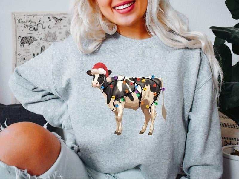 Christmas Cow Sweatshirt, Cow Lights Sweater, Merry Christmoos Hoodie, Animal X-mas Party Gift Sweatshirt, Western Holiday Sweater.