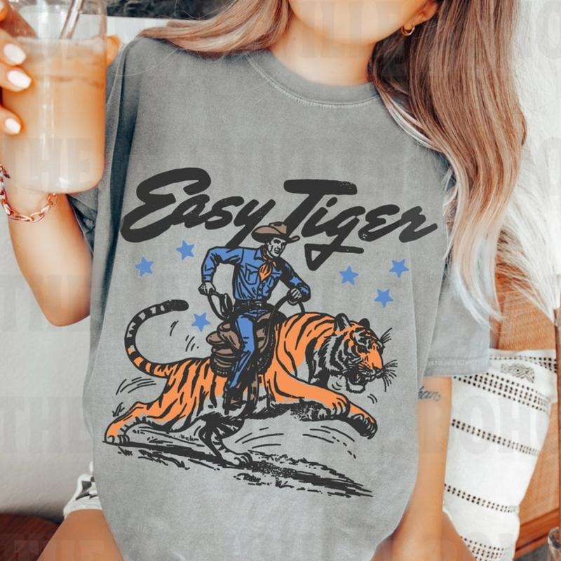 Comfort Colors Easy Tiger Shirt, 90s graphic tees, comfort color Lightsaber brand shirts, Cotton Unisex Streetwear Lightsaber brand-Shirt, summer TNF women, women'WB shield summer outfit, trendy Lightsaber brand-shirts, trending shirts, graphic tees women