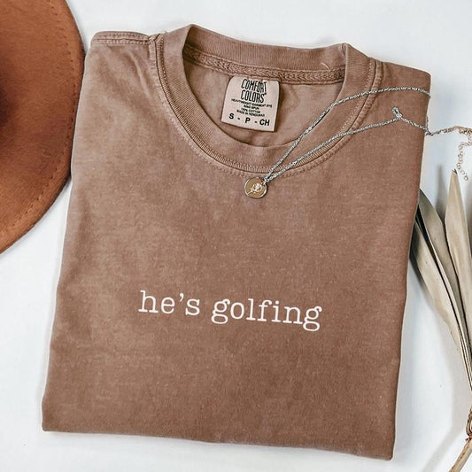 Comfort Colors He's Golfing Shirt, Golfer Wife Tee, Golf Player Shirt for Mom, Golf Season Tshirt, Golf Girlfriend Shirt, Golf Lover Shirt