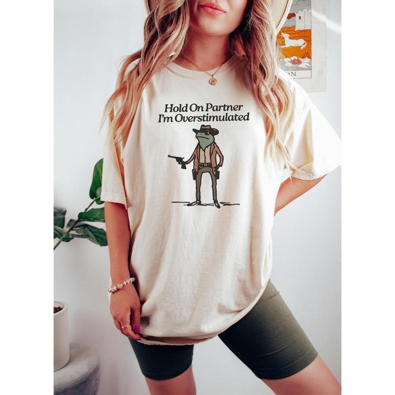 Comfort color Hold On Partner Im Overstimulated Shirt, Cowboy Frog, Unhinged Tshirt, Weird Stuff Funny Funny Meme Tshirt,...