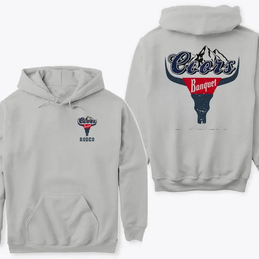 Coors Banquet Rodeo Hoodie Sweatshirt TShirt- Bold Western Rodeo Design Featuring Coors Banquet Logo and Bull Skull, Perfect for Rodeo Fans and Beer Lovers. Suitable for Men and Women.