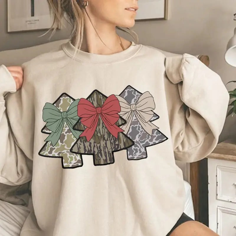 Coquette Bow Camo Christmas Trees Hunting Crewneck Sweatshirt, Retro Camo Bottomland Shirt Hoodie | DripVista.com