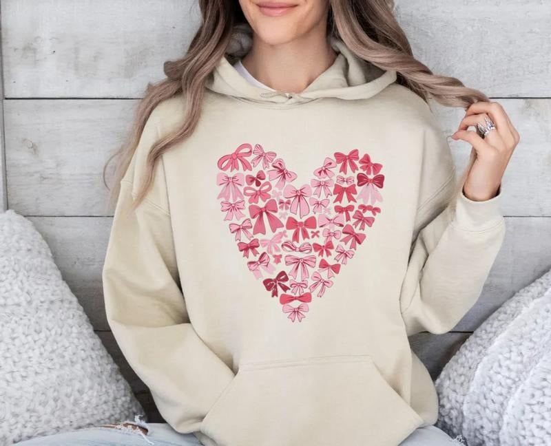 Coquette Bow Valentine's Day Sweatshirt, Pink Bow Heart Valentine Hoodie, Pink Bow Valentines Day Gift, Unisex Crewneck...