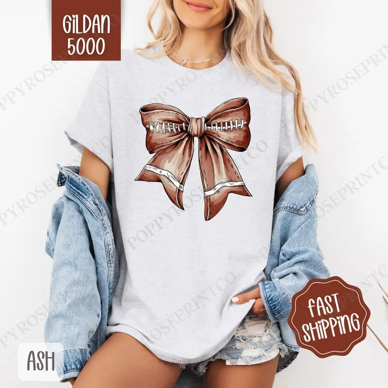 Coquette Football Bow Shirt Gildan, Trendy Women's Tee, Cute Women's Tshirt Plus Sizes Hoodie, Sweatshirt | DripVista.com