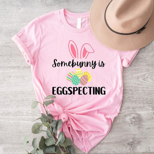 Easter Pregnancy Announcement Shirt, Spring Baby Reveal T-Shirt, Maternity Tee, Pregnant Wife Gift Shirt For Easter, New Mom To Be Short Sleeve.