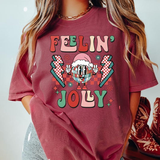 FEELIN JOLLY DISCO T-SHIRT (COMFORT COLORS T-SHIRT, CASUAL SHIRT UNISEX, CHRISTMAS CLOTHING, GRAPHIC APPAREL, HOLIDAY SHIRT) Cotton Fabric
