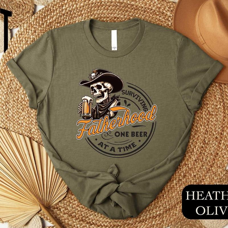 Fatherhood Shirt,Surviving Fatherhood One Beer At A Time,Funny Father Shirt,Funny Dad,Drinking Husband,Fathers Day Gift,Funny Gift For Dad