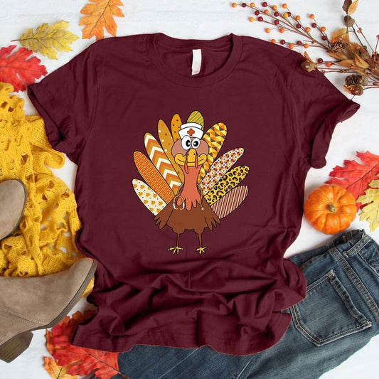 Funny Nurse Turkey Thanksgiving T-Shirt for Women Cute Fall Nurse Holiday Tee Colorful Turkey Design