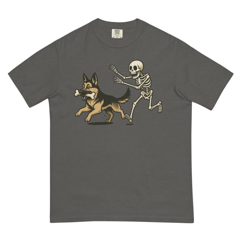 Funny Skeleton Chasing German Shepherd Dog Halloween T-Shirt Spooky Graphic Tee Comfort Colors Style Unisex Relaxed Fit 100% Ring-Spun Cotton Honduras Made Casual Cartoon Short Sleeve Crew Neck Summer Occasion