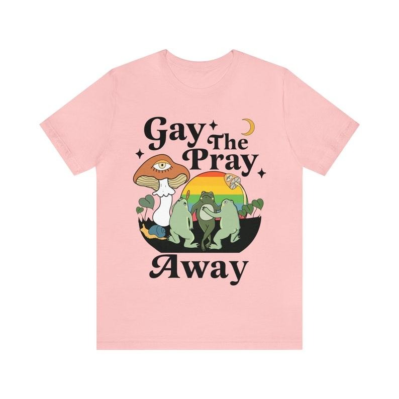 Gay the pray away shirt | gay frog shirt | funny gay shirt | cottagecore lgbtq shirt | retro queer | lesbian | bisexual |...