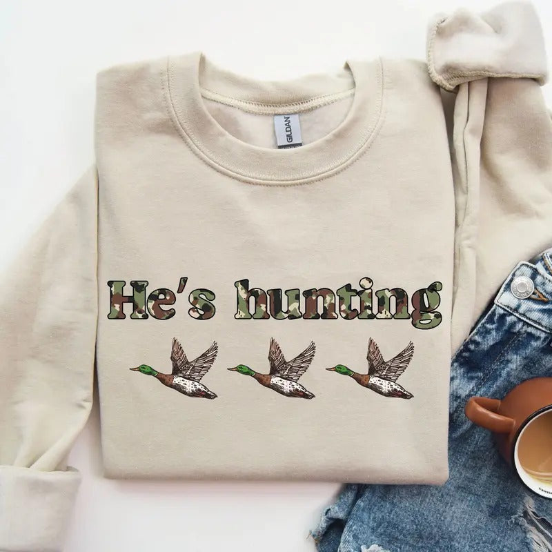 He is Hunting Ducks Camoflauge Bottomland Pattern Sweatshirt, Hunting Camo Unisex Shirt Hoodie | DripVista.com