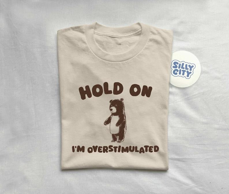 Hold On I'm Overstimulated - Unisex  sweater T-Shirts, Hoodie, Sweatshirt | DripVista.com
