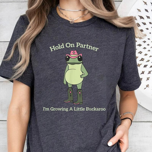 Hold On Partner I'm Growing A Little Buckaroo T-Shirt Sweatshirt Hoodie, Cute Animal T-Shirt, Funny Frog T-Shirt, Unhinged T-Shirt, Pregnancy Reveal T-Shirt, First Time Mom Gift