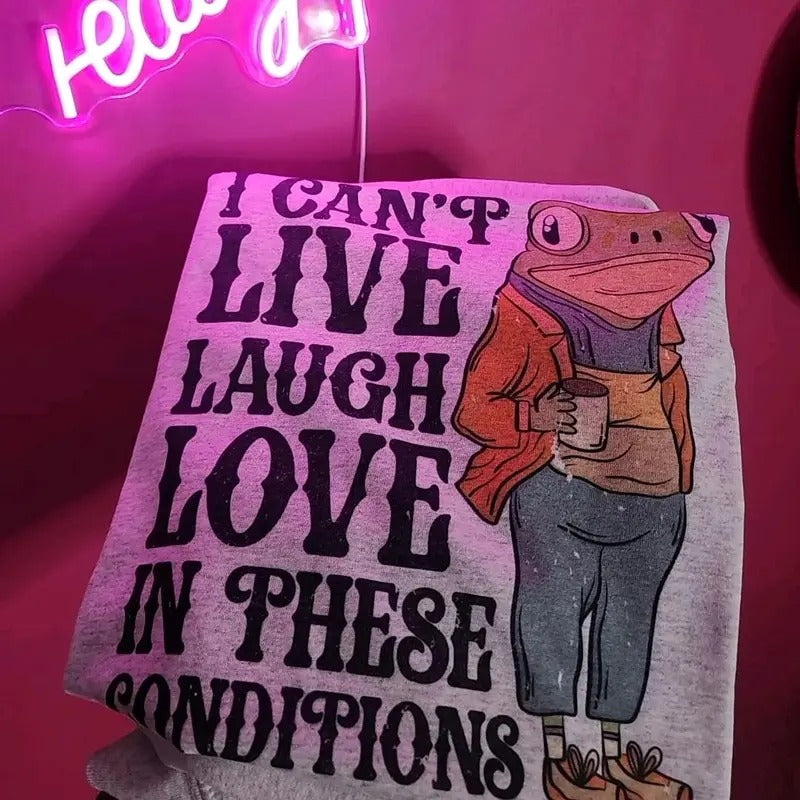 I can't live laugh love in these conditions Graphic Tee Hoodie, Sweatshirt | DripVista.com