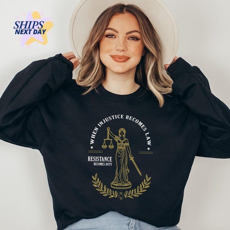 Jessie J Ross Lady Justice Sweatshirt, When Injustice Becomes Law Resistance Becomes Duty Hoodie, Unisex Graphic Tee, Smooth Fabric, Aesthetic Streetwear Vibe