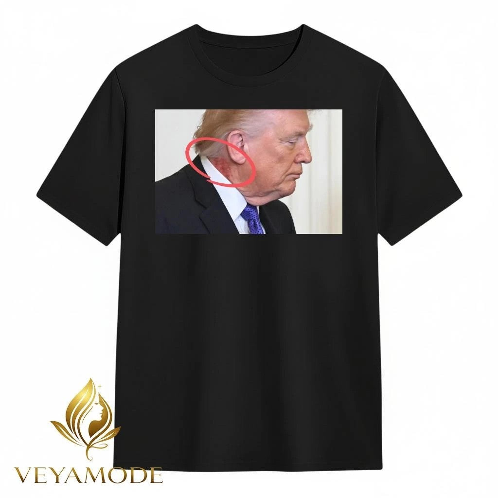 Large red mark on the neck of US President Donald Trump tee