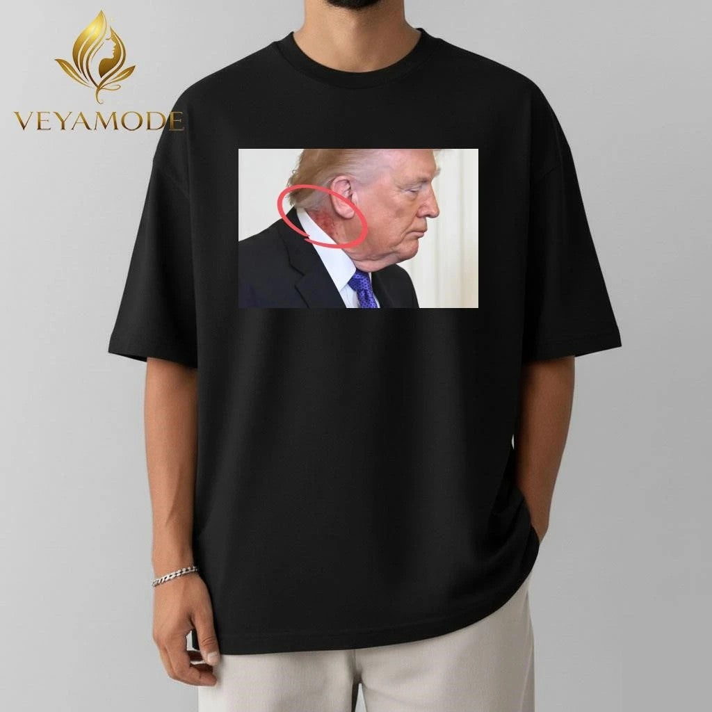 Large red mark on the neck of US President Donald Trump tee