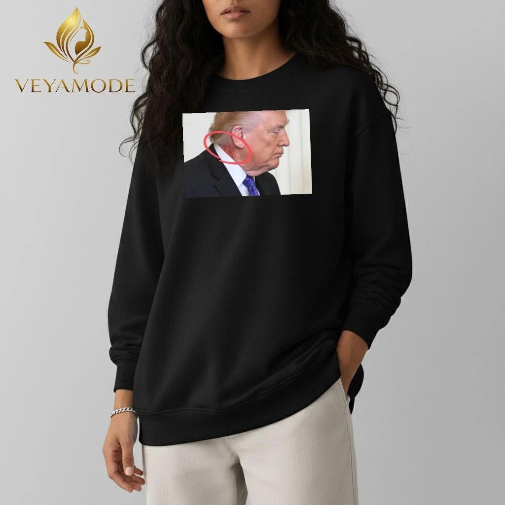 Large red mark on the neck of US President Donald Trump tee