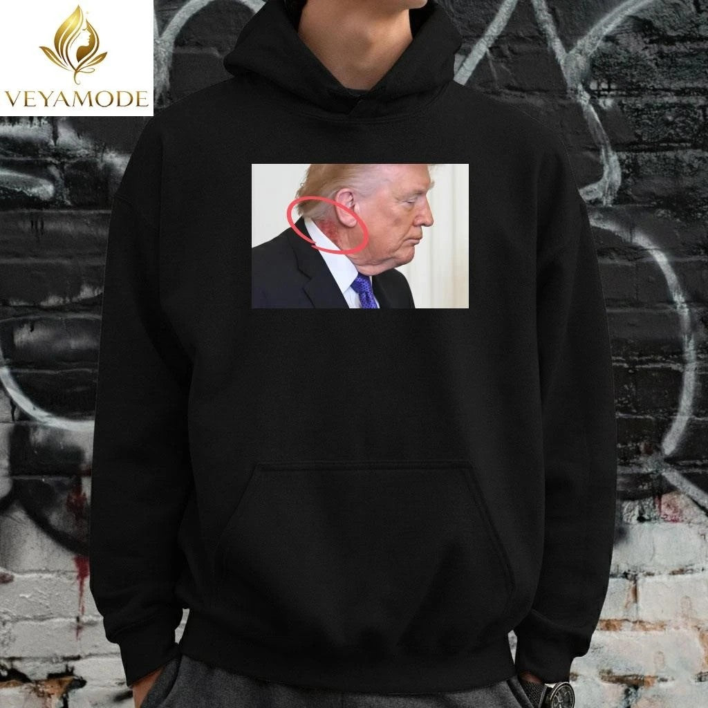 Large red mark on the neck of US President Donald Trump tee