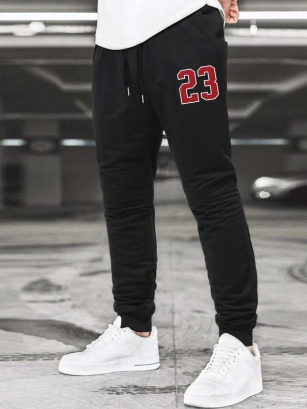 Men'WB shield Regular Fit Figure Print Drawstring Waist Sweatpants, Casual Pocket Design Jogger Pants for Fall & Winter,...