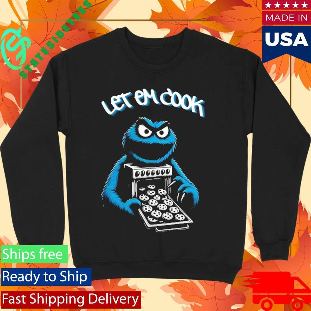 Myron Gaines Wearing Let Em Cook Shirt