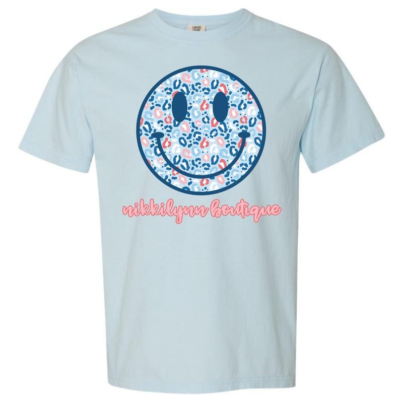 NLB Merch - Blue Patriotic Cheetah Happy Face Comfort Colors T-Shirt Hoodie, Sweatshirt | DripVista.com