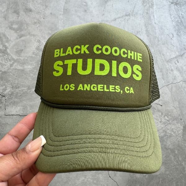 Olive Black Coochie Studios Adjustable Unisex Trucker Hat T-Shirts, Hoodie, Sweatshirt | DripVista.com