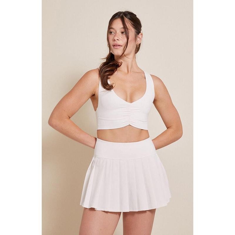 PAC 1980 Women's PAC WHISPER Active Ivory Dropped Waist Pleated Mini Skort T-Shirts, Hoodie, Sweatshirt | DripVista.com