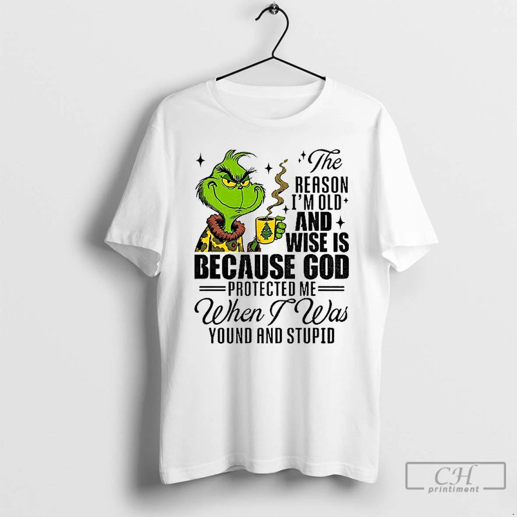 Premium Grinch Santa The Reason Im Old And Wise Is Because God Protected Me When T-Shirts, Hoodie, Sweatshirt | DripVista.com