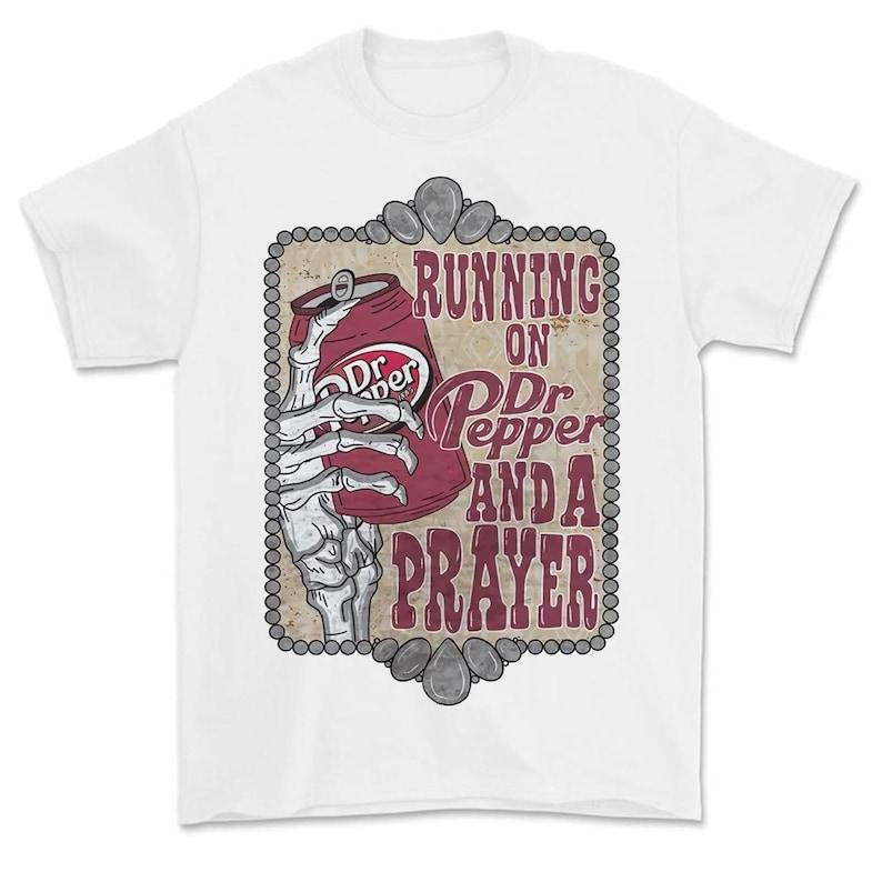 Running On Dr Pepper And A Prayer T-Shirt, Running on Prayer And Dr. Pepper T-Shirt Hoodie, Sweatshirt | DripVista.com