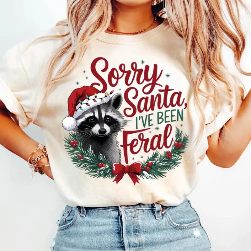 Sorry Santa I've been Feral Tee, Christmas Season T-shirt, Christmas Feral girl Shirt Hoodie, Sweatshirt | DripVista.com