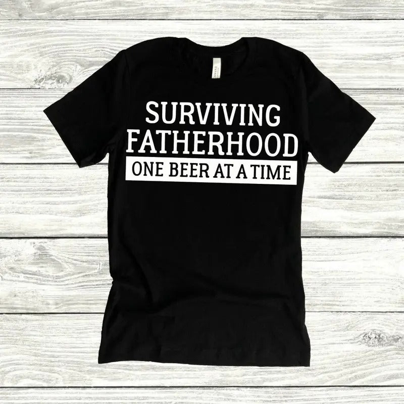 Surviving Fatherhood One Beer At A Time Shirt Father's Day Shirt Gift For Dad Dad Life Fatherhood Hoodie, Sweatshirt