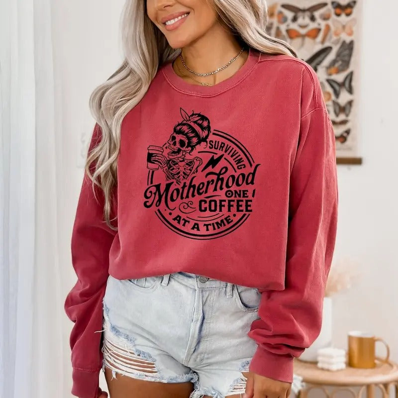 Surviving Motherhood One Coffee at a Time T-Shirt, Funny Mom Life Tee, Skull Graphic Shirt, Mother's Day shirt Hoodie,...