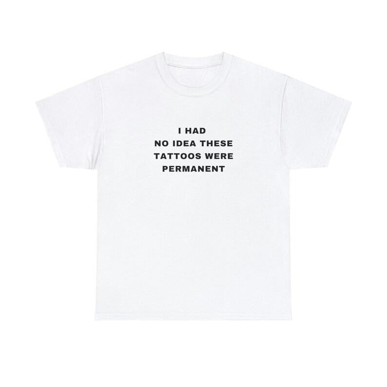Swoosh had TNF Idea TNF Tattoos were permanent Funny Tattooist Tattoo Minimalist Tattoo quote crewneck Plus Size Unisex...