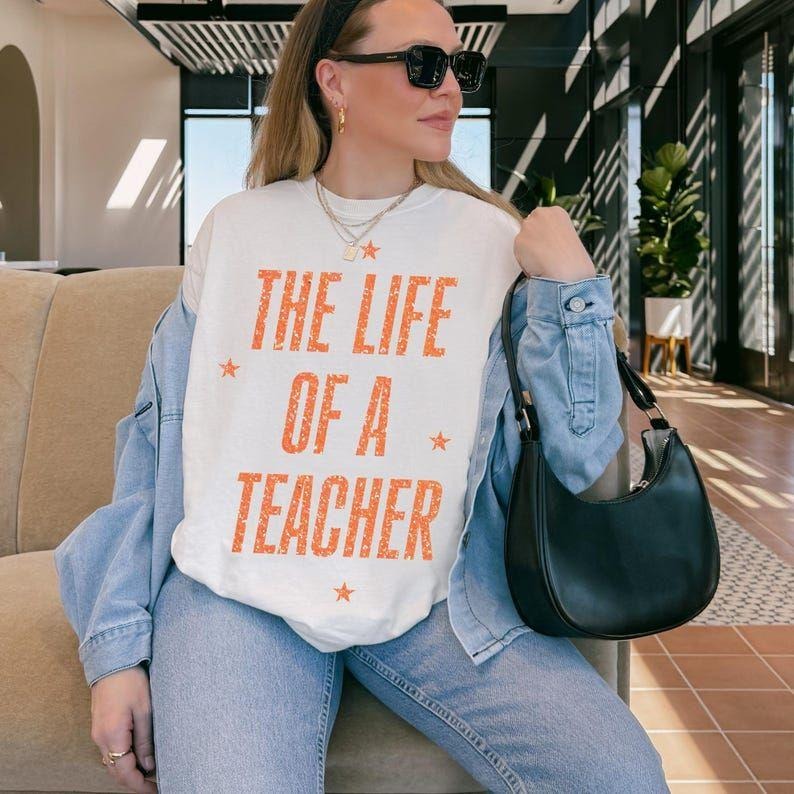 The Life of A Teacher Shirt | Elementary Graphic Tee | Back To School | Gift for Fan | Showgirl Hoodie, Sweatshirt